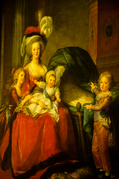 Painting of Queen Marie Antoinette and children in Versailles Palace, France.