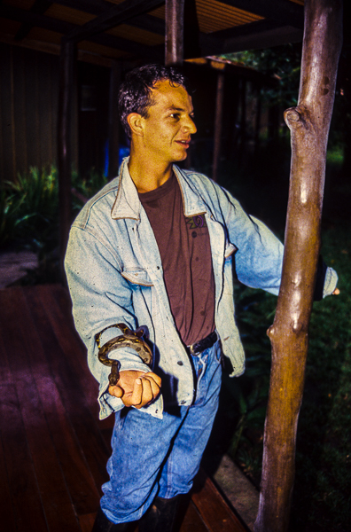 Naturalist guide at Mawamba Lodge with snake.